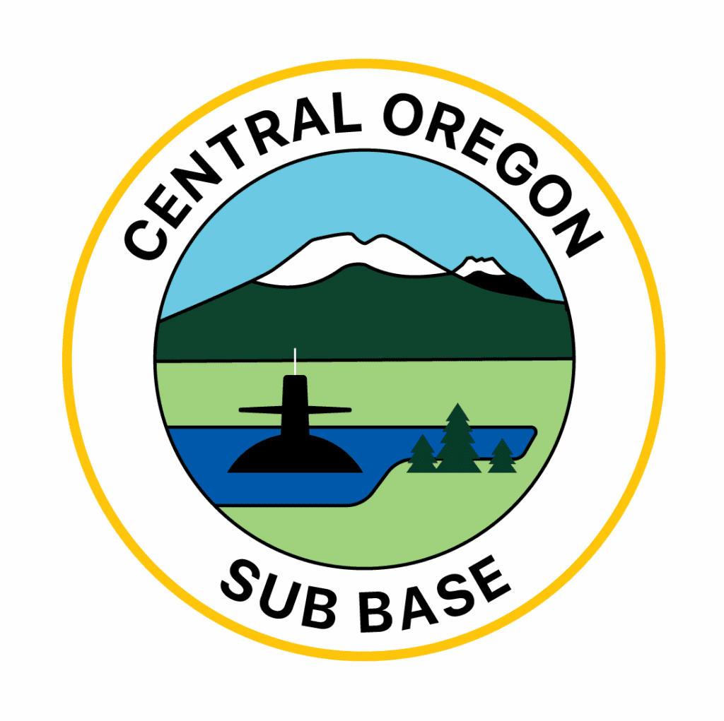 Logo of Central Oregon Sub Base with mountain and water imagery.